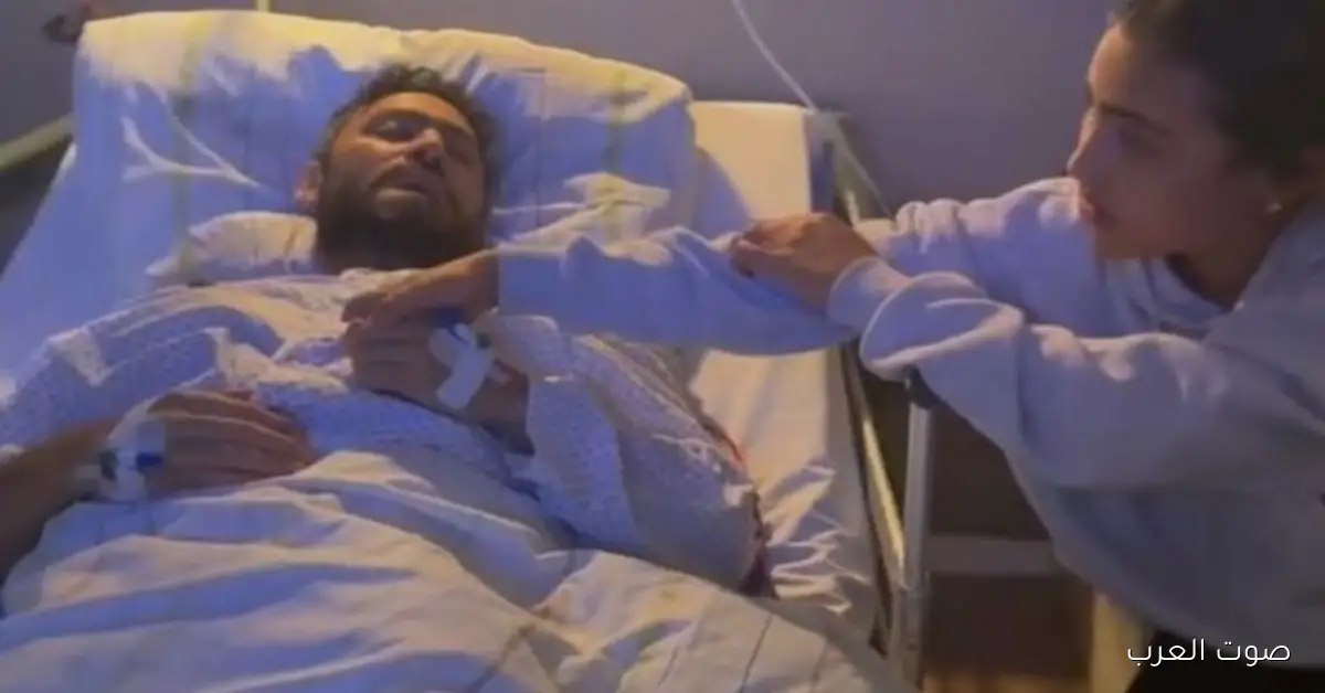 أحمد زاهر واقف جنب تامر حسني بعد مرضه