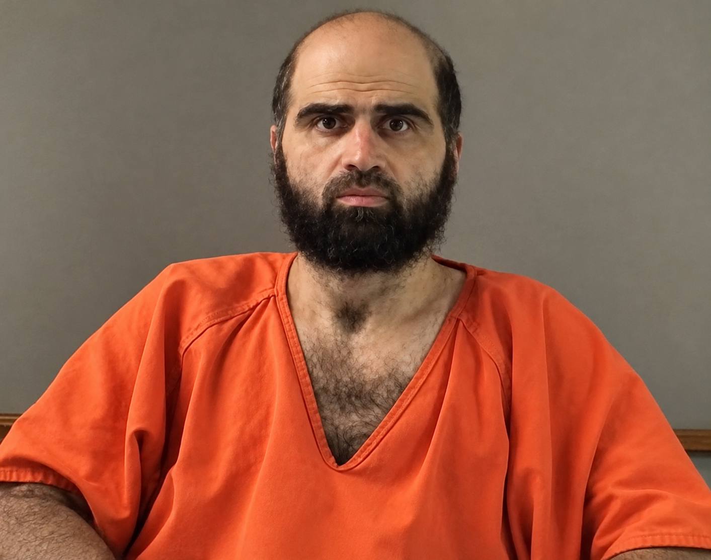 Realistic Mugshot Portrait in Orange Jumpsuit